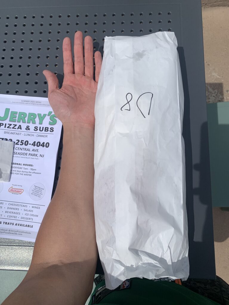 Jerry's Pizza & Sub - Hand size comparison