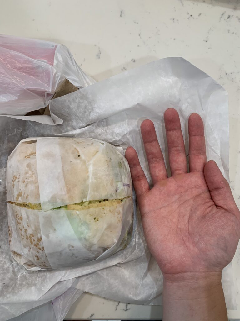 Trinciti Roti Shop - Bake and Shark - Hand comparison