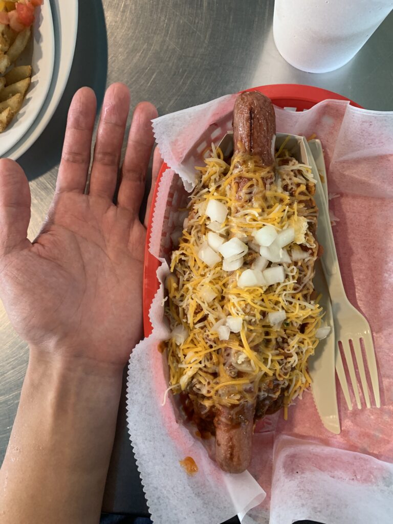 Junkyard dog hand size comparison.