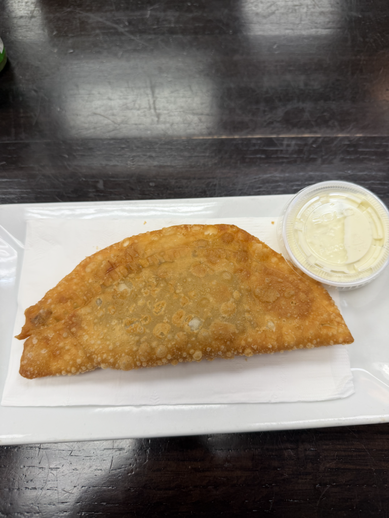 Mis Raices Restaurant - Beef with cheese Empanada