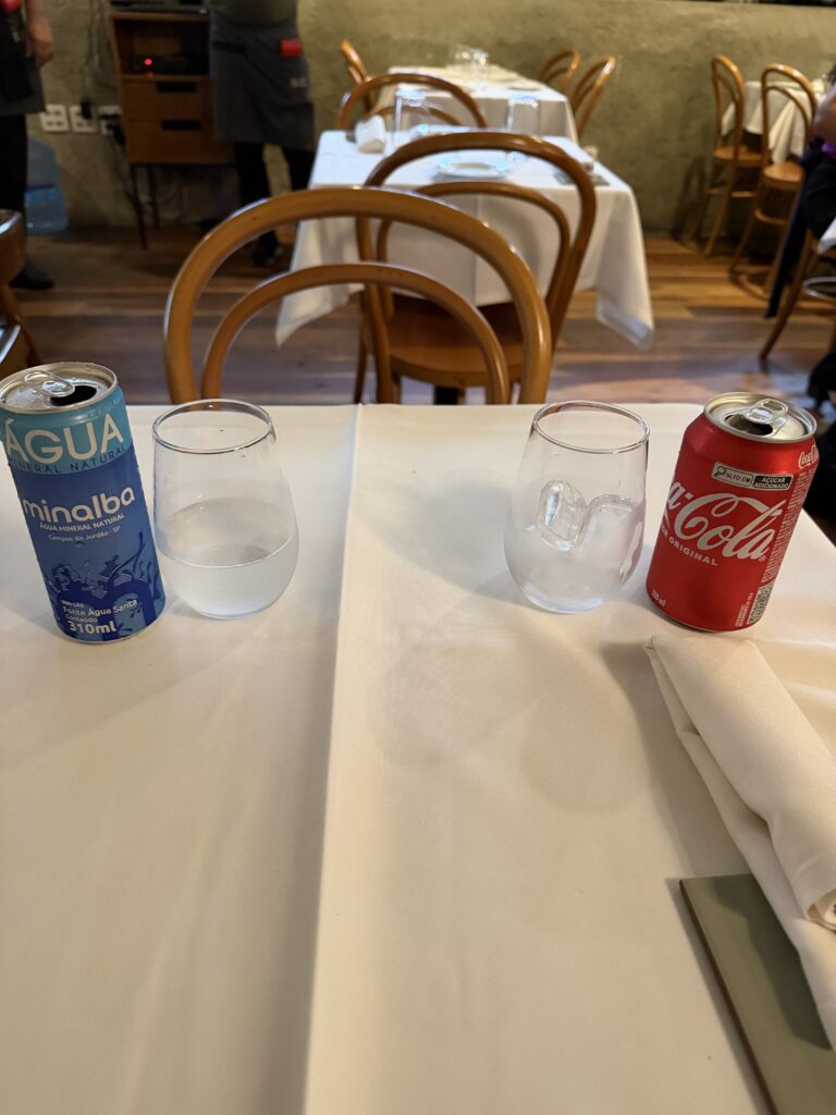 Sult - Table with Coca Cola and water